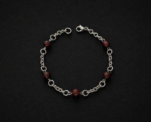 handmade stainless steel bracelet red goldstone beads witchy boho jewelry