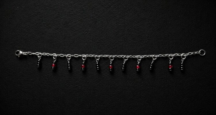 handmade stainless steel charm bracelet red black glass beads gothic witchy